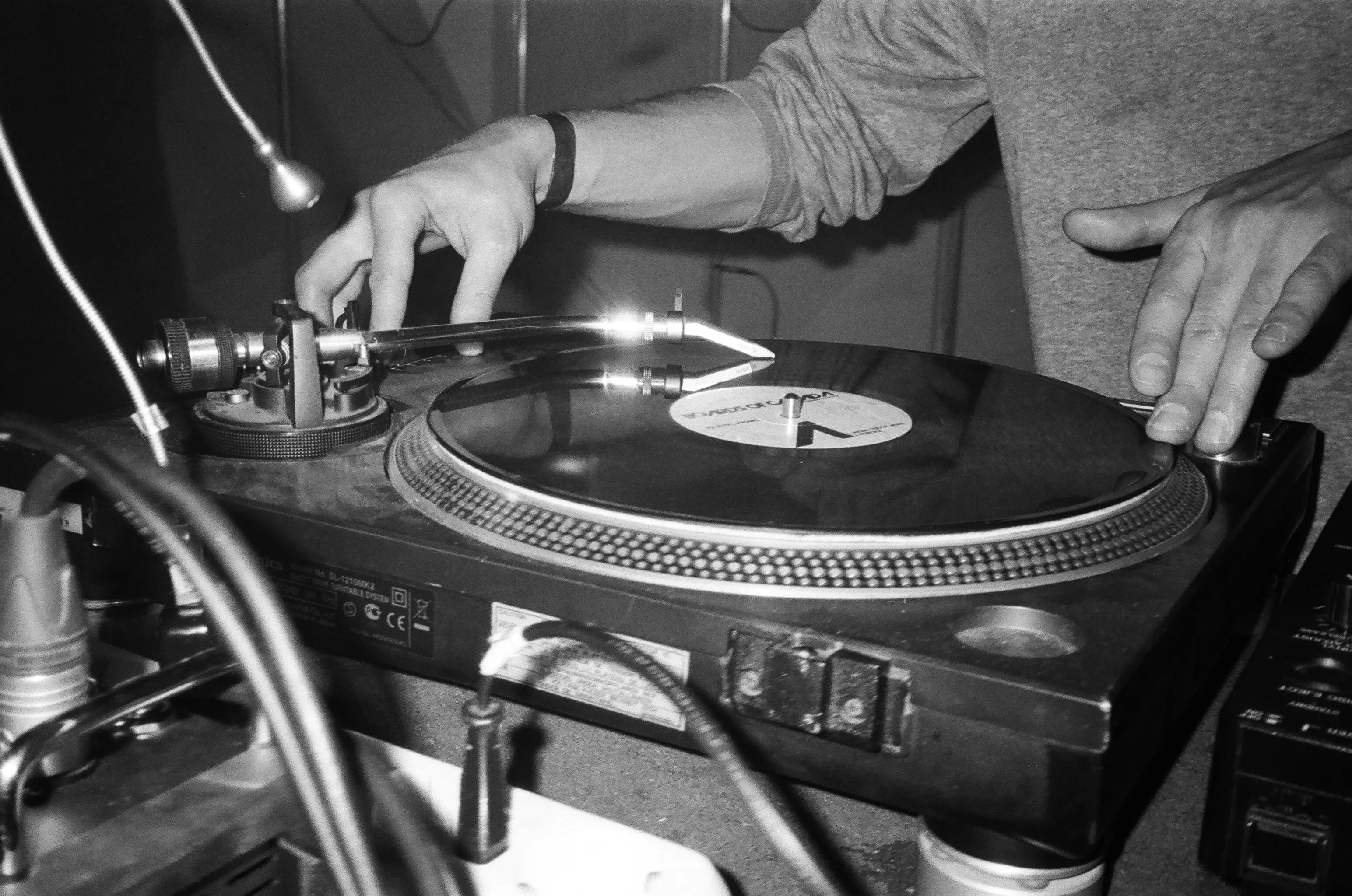 DJ equipment and vinyl records on a table